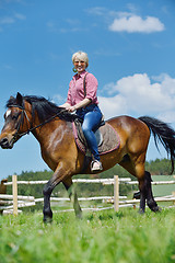 Image showing happy woman  on  horse