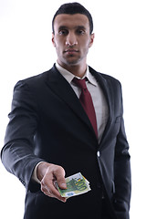 Image showing Business man holding money