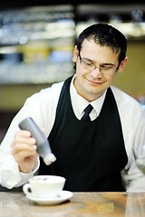 Image showing Barista prepares cappuccino