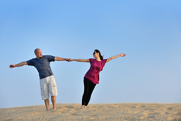 Image showing couple enjoying the sunset