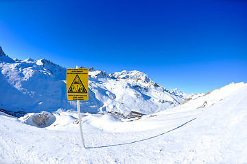 Image showing Sign board at High mountains under snow in the winter