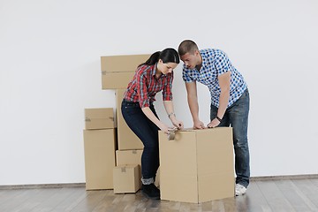 Image showing Young couple moving in new house