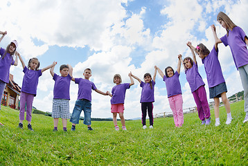 Image showing happy kids group  have fun in nature