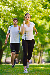 Image showing Young couple jogging