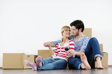 Image showing Young couple moving in new house