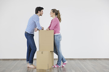 Image showing Young couple moving in new home