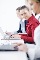 Image showing business woman group with headphones