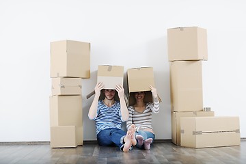 Image showing Young couple moving in new house