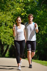 Image showing Young couple jogging