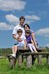 Image showing happy young family have fun outdoors