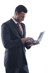 Image showing business man work on mini laptop