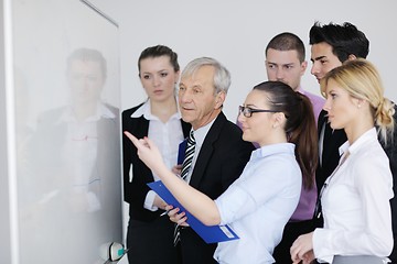 Image showing Senior business man giving a presentation