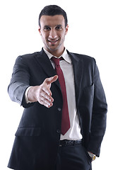 Image showing business man giving you a hand shake