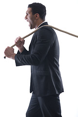 Image showing business man with rope isolated on white background