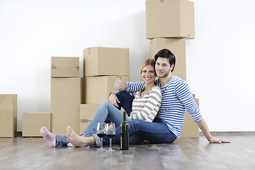 Image showing Young couple moving in new home