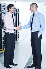 Image showing it enineers in network server room