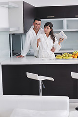 Image showing young couple have fun in modern kitchen