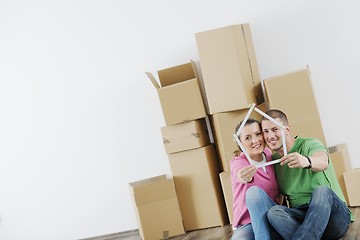 Image showing Young couple moving in new house