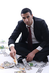 Image showing Business man holding money