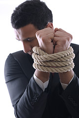 Image showing business man with rope isolated on white background