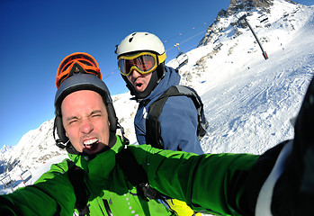 Image showing winter portrait of friends at skiing