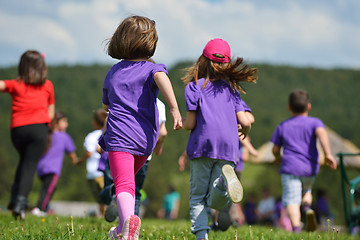 Image showing happy kids group  have fun in nature