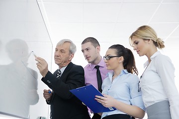 Image showing Senior business man giving a presentation