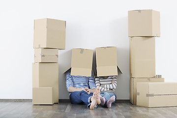 Image showing Young couple moving in new home