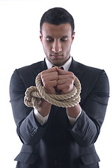 Image showing business man with rope isolated on white background