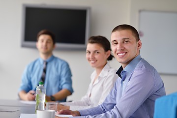 Image showing business people in a meeting at office