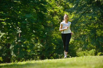 Image showing Young couple jogging