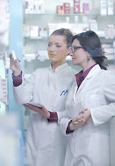 Image showing team of pharmacist chemist woman  in pharmacy drugstore