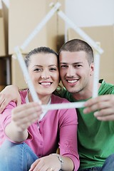 Image showing Young couple moving in new house