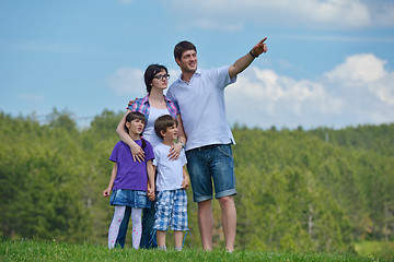 Image showing happy young family have fun outdoors