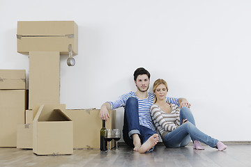 Image showing Young couple moving in new home