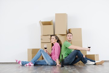 Image showing Young couple moving in new house