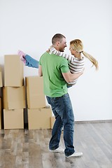 Image showing Young couple moving in new house