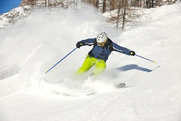 Image showing skiing on fresh snow at winter season at beautiful sunny day