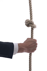 Image showing business man with rope isolated on white background