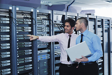 Image showing it enineers in network server room