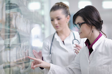 Image showing team of pharmacist chemist woman  in pharmacy drugstore