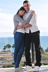 Image showing couple relaxing on balcony