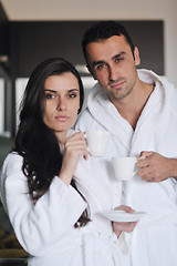 Image showing Young love couple taking fresh morning cup of coffee