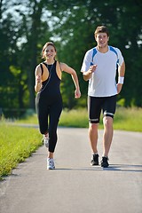 Image showing Young couple jogging at morning