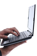 Image showing business man work on mini laptop