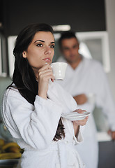 Image showing Young love couple taking fresh morning cup of coffee