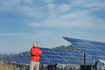 Image showing Male solar panel engineer at work place