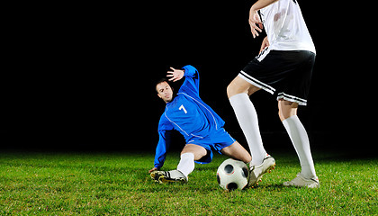 Image showing football players in action for the ball