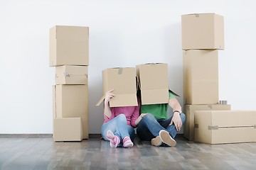 Image showing Young couple moving in new house