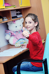 Image showing girl doing homework